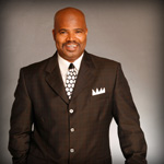 Bishop Michael Canion standing